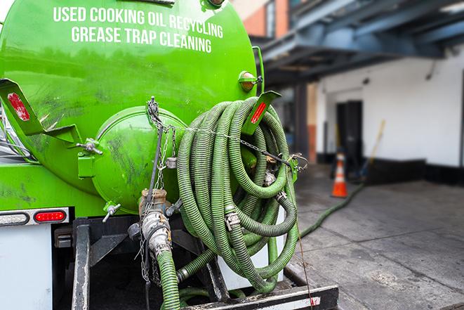 pumping out excess grease and waste from a restaurant's trap in Gadsden, AZ